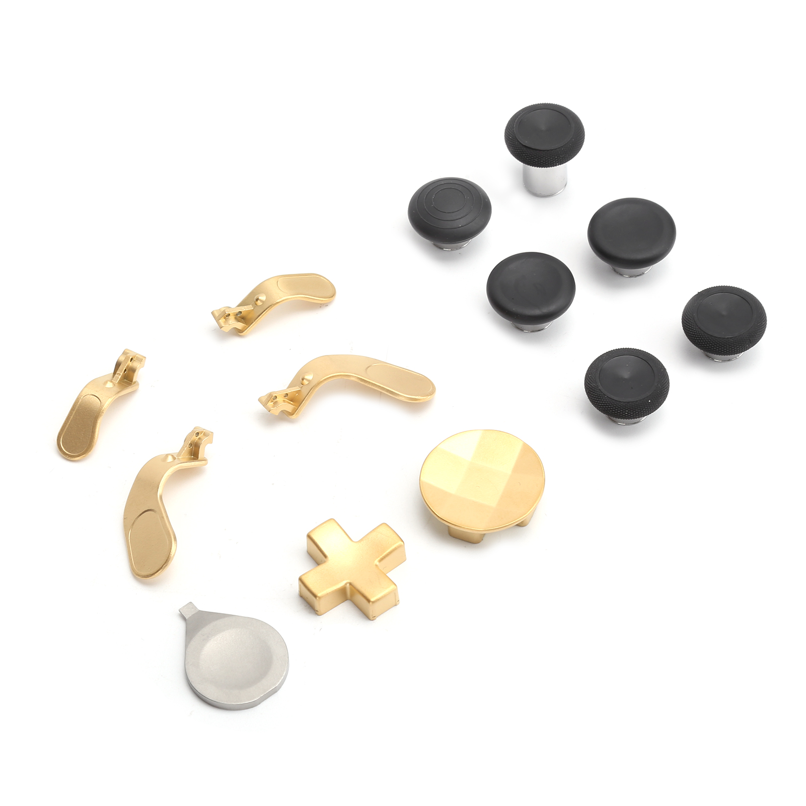 Modulare Controller-Ersatzteile mit goldenen Schultertasten, Steuorkreuzen und schwarzen Joysticks auf weißem Grund.