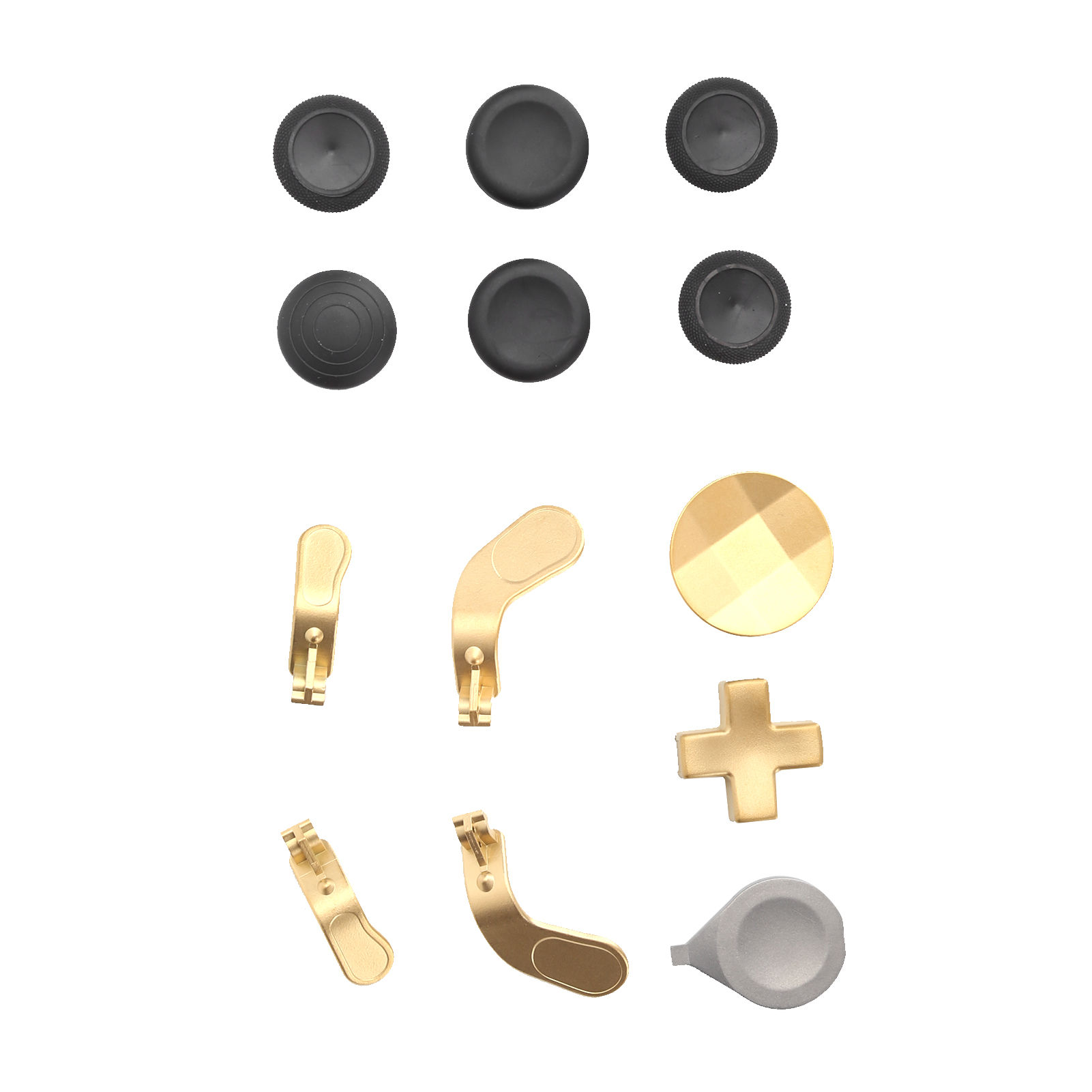 Ersatzteile für Controller, darunter schwarze Daumensticks, goldene Paddles, ein goldener D-Pad und ein Werkzeug auf weißem Grund.