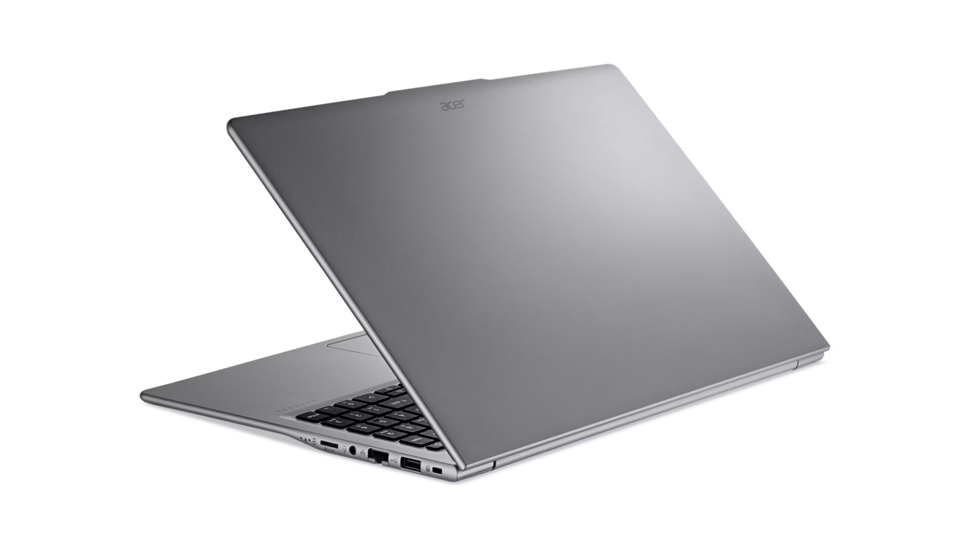 Un laptop Acer grigio su una superficie bianca, che mostra il retro dello schermo con il logo e la tastiera.