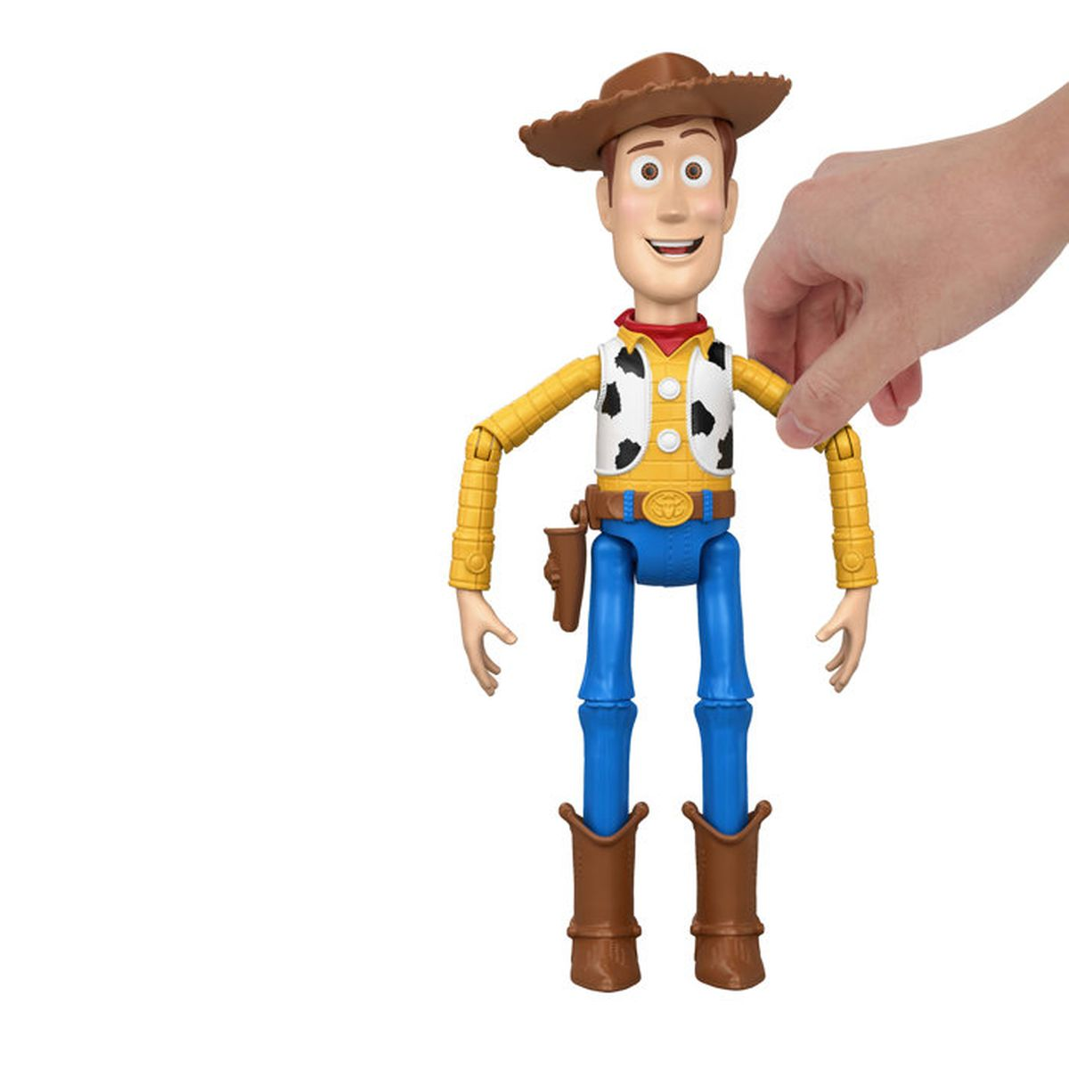 Eine Hand hält eine Woody-Actionfigur aus Toy Story mit Cowboyhut, gelbem Hemd und blauen Jeans.