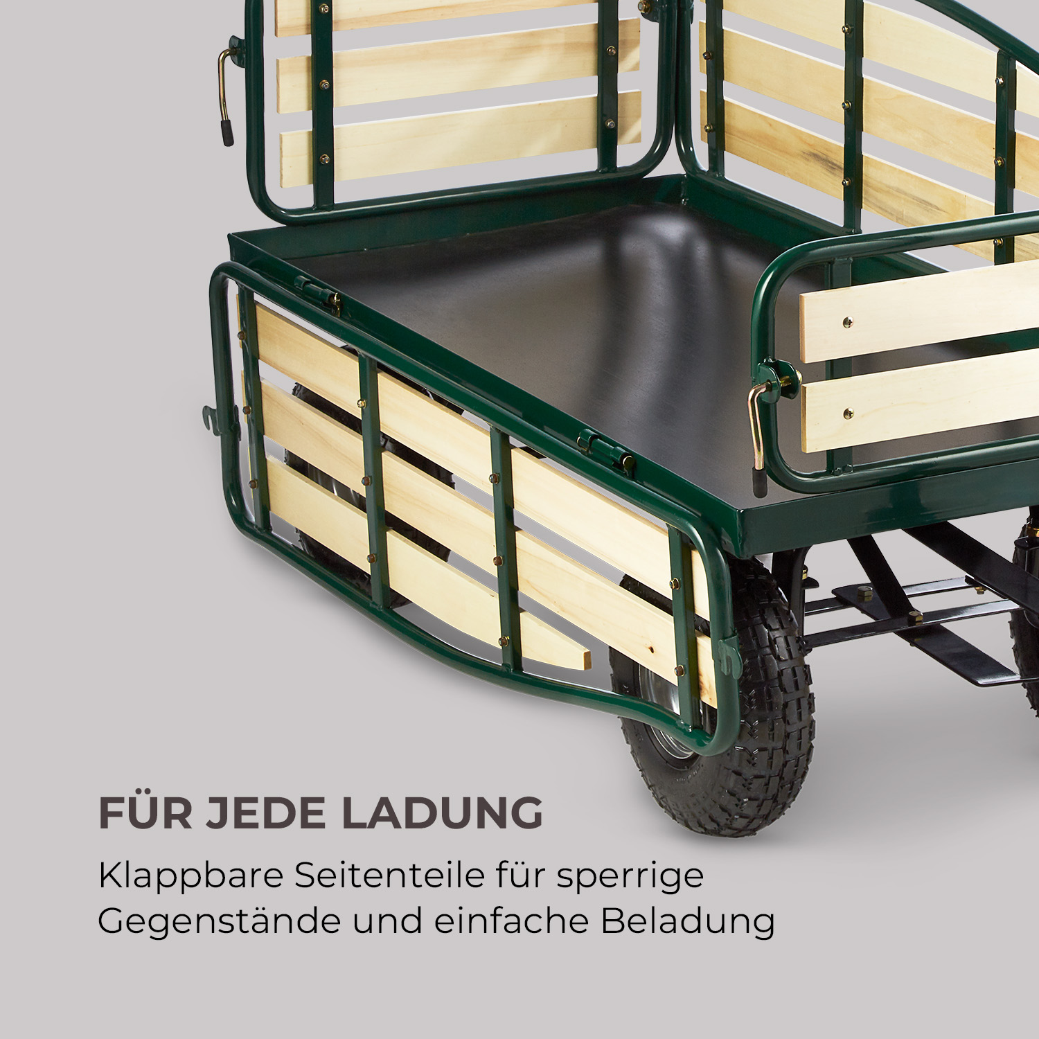Grüner Bollerwagen mit klappbaren Holzseitenteilen und schwarzem Innenraum.