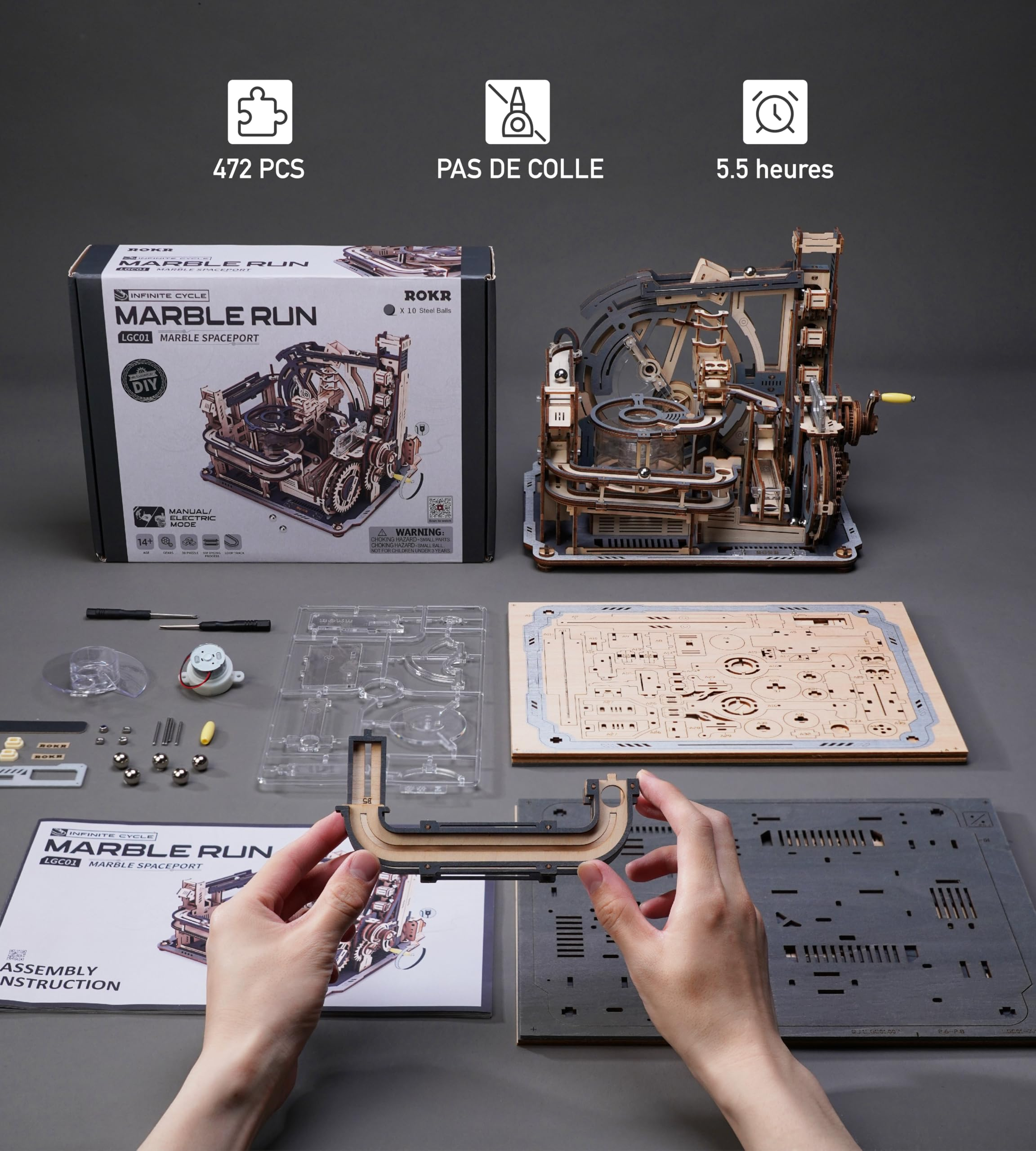 Kit de circuit de billes en bois avec boîte, pièces et modèle.