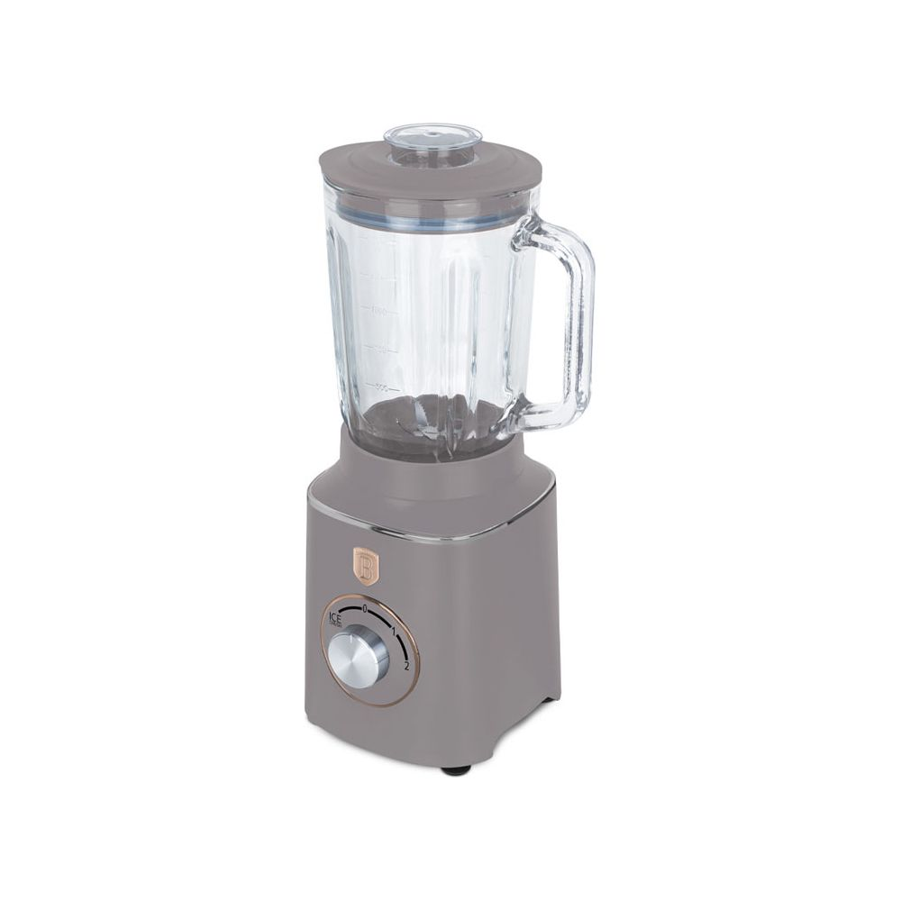 Un blender gris avec un bol en verre et un bouton de commande argenté sur fond blanc.