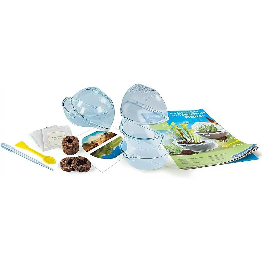 Ein Pflanzzuchtset mit transparenten Kunststoffkuppeln, Samentüten, Erde, Pipette, Löffel und Anleitung.