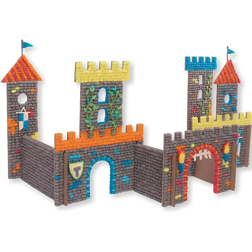 Buntes Spielzeugschloss aus Schaumstoffbausteinen mit Türmen, Toren und Flaggen auf weißem Hintergrund.
