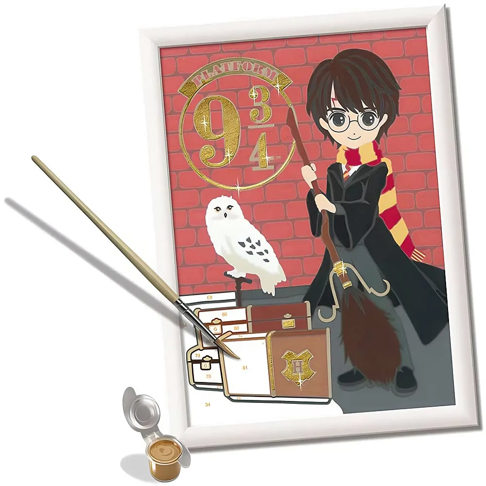 Ein Harry-Potter-Malen-nach-Zahlen-Set mit Pinseln und Farbe neben einem gerahmten Bild.