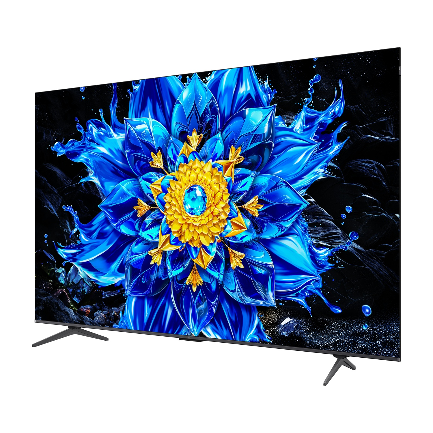 Un televisor muestra una flor abstracta azul y amarilla con salpicaduras de agua sobre un fondo negro.