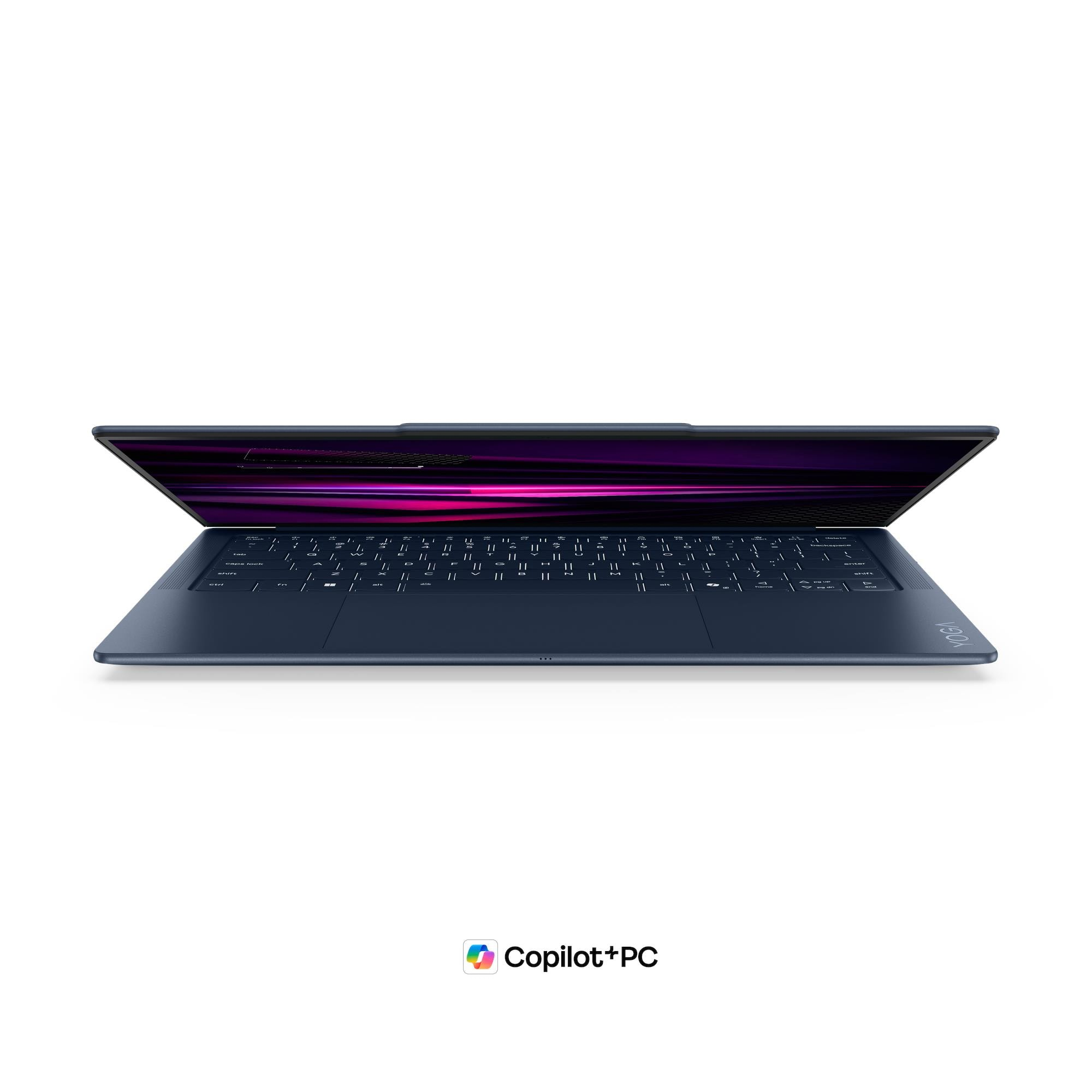 Un computer portatile blu scuro con tastiera e schermo con grafica viola, visto di fronte su sfondo bianco.