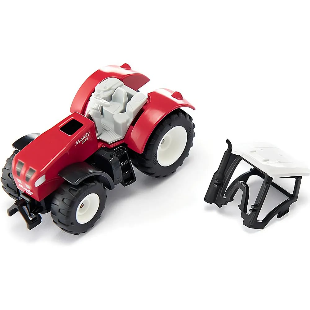 Ein roter Spielzeugtraktor mit grauem Innenraum steht auf einer weißen Oberfläche neben seiner abnehmbaren Kabine.