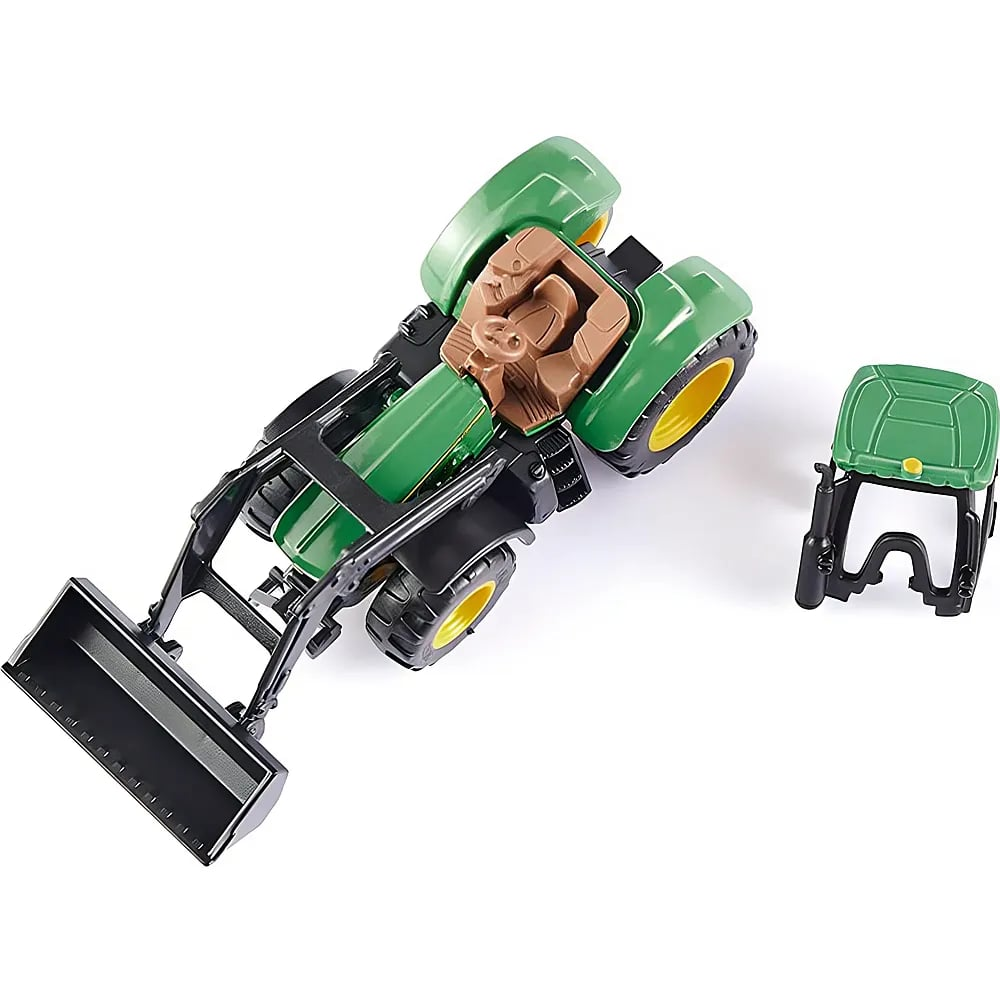 Grüner Spielzeugtraktor mit Frontlader und abnehmbarer Kabine auf weißem Grund.