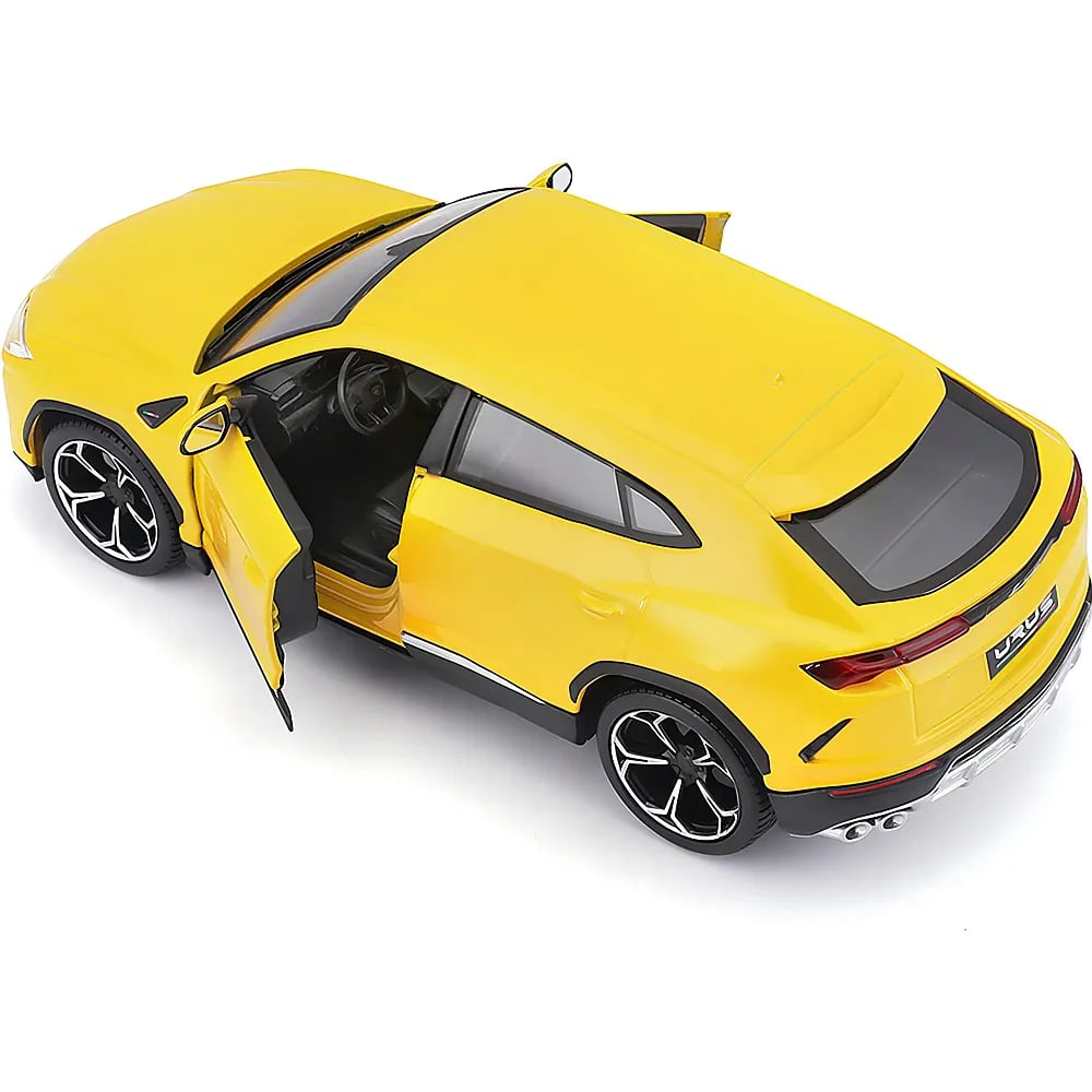 Une voiture miniature jaune vif avec les portes avant ouvertes sur fond blanc.
