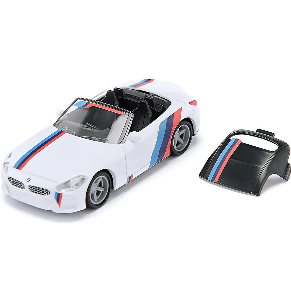Ein weißes BMW-Spielzeugauto mit Rennstreifen und abnehmbarem schwarzen Verdeck auf weißem Grund.
