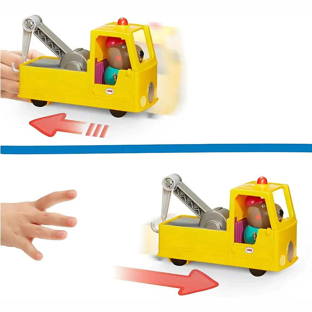 Un bambino spinge un carro attrezzi giocattolo giallo con una figura di castoro.