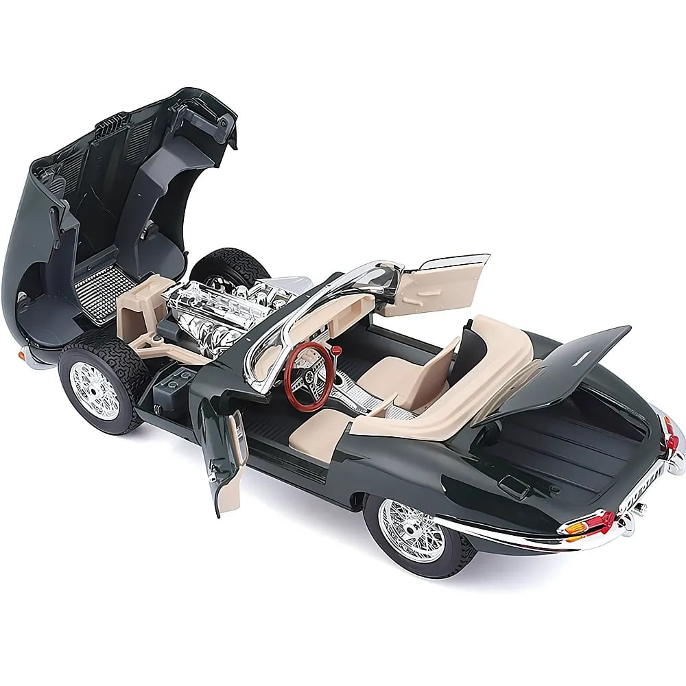 Dunkelgrünes klassisches Modellauto mit geöffneter Haube, Türen und Kofferraum, beigem Interieur und verchromtem Motor.