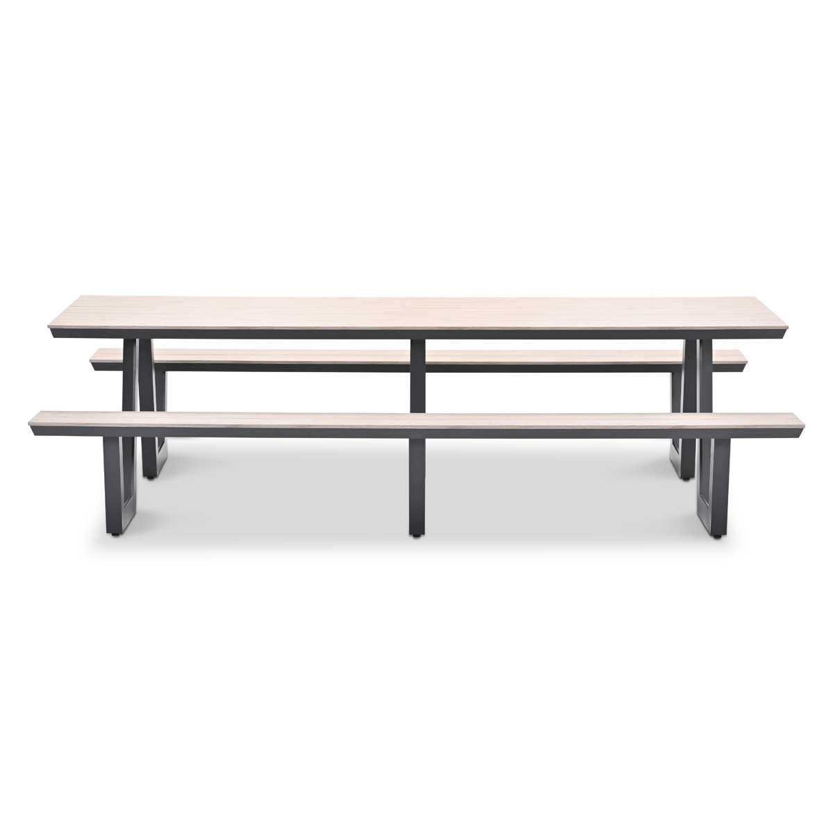 Long wooden table with matching benches and grey metal legs on a white background.