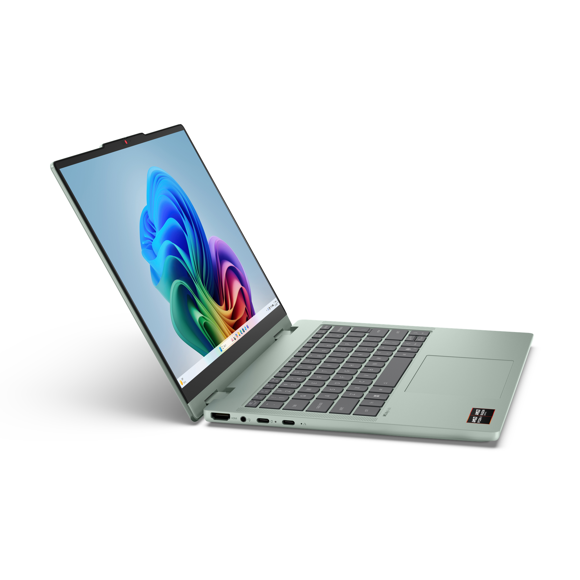 Ein offener, hellgrüner Laptop steht auf weißem Grund und zeigt einen bunten Bildschirm.