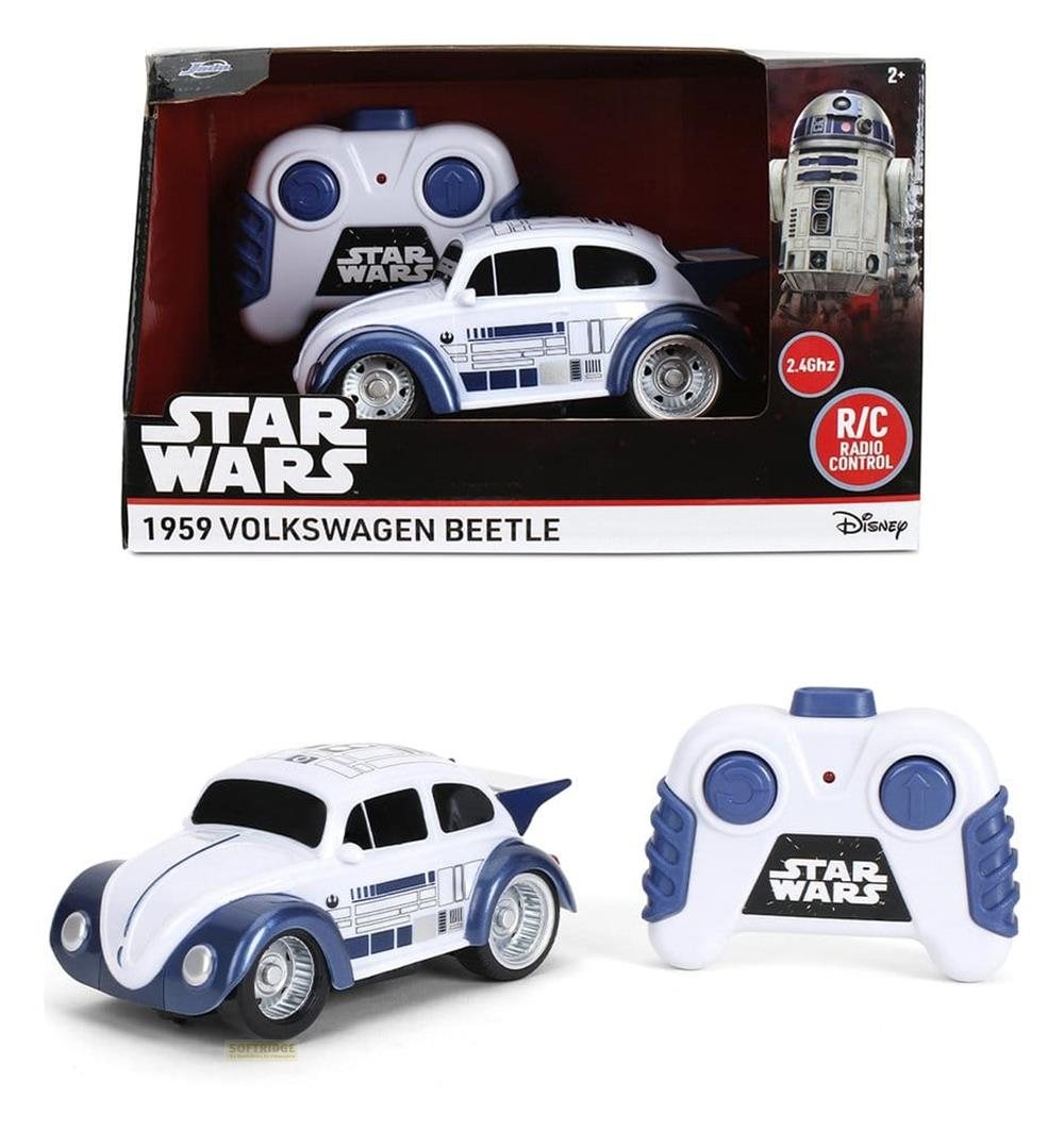 Ein Star Wars R2-D2 RC 1959 VW Käfer Spielzeugauto mit Fernbedienung, in und vor der Verpackung.