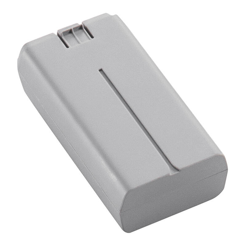 Batteria rettangolare grigia con bordi arrotondati e un connettore.