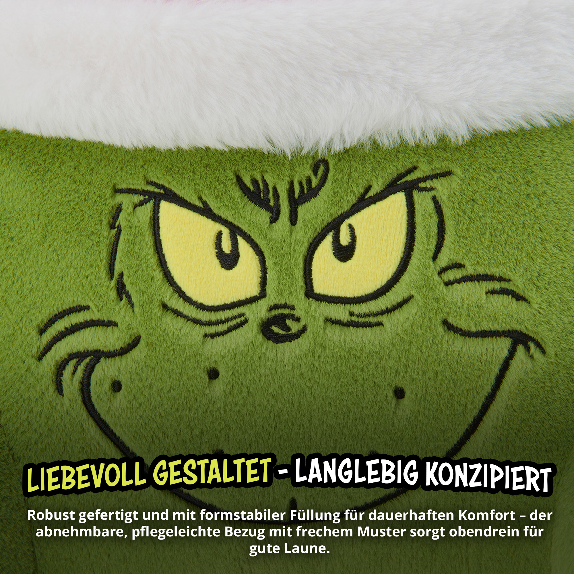 Grinch-Gesicht mit gelben Augen auf grünem Plüsch unter weißem Fellrand, mit Text.