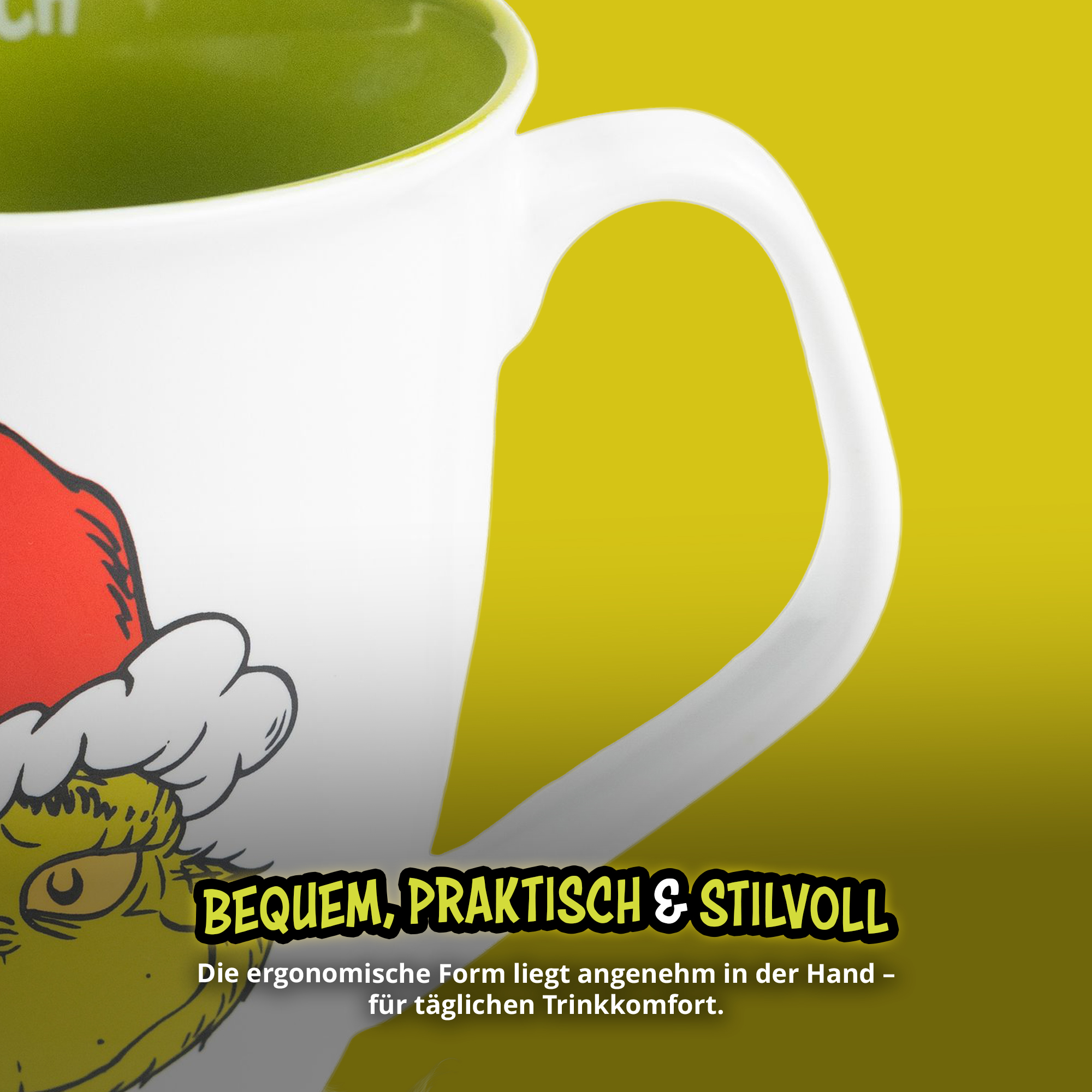 Weiße Tasse mit grünem Innenraum und Grinch-Motiv vor gelbem Hintergrund.