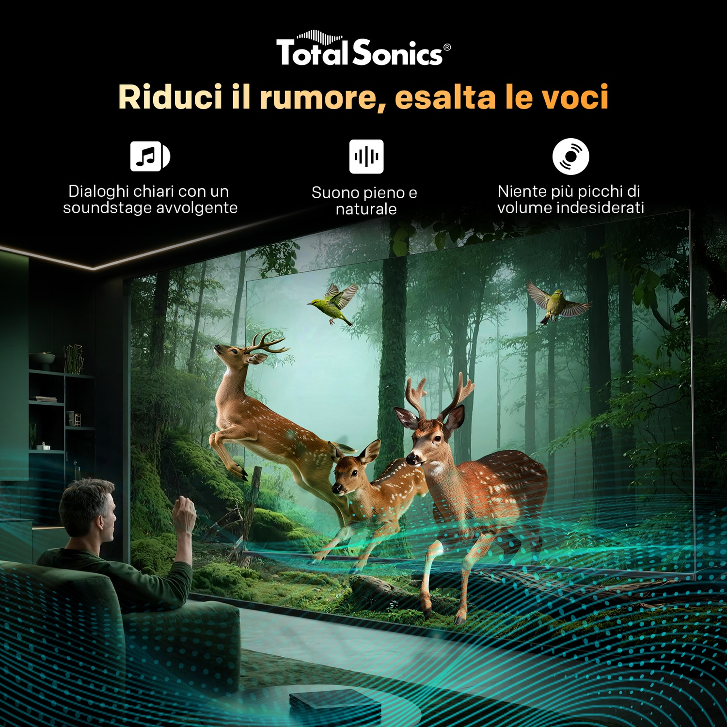 Un uomo sul divano guarda un grande schermo con una scena di cervi nella foresta.