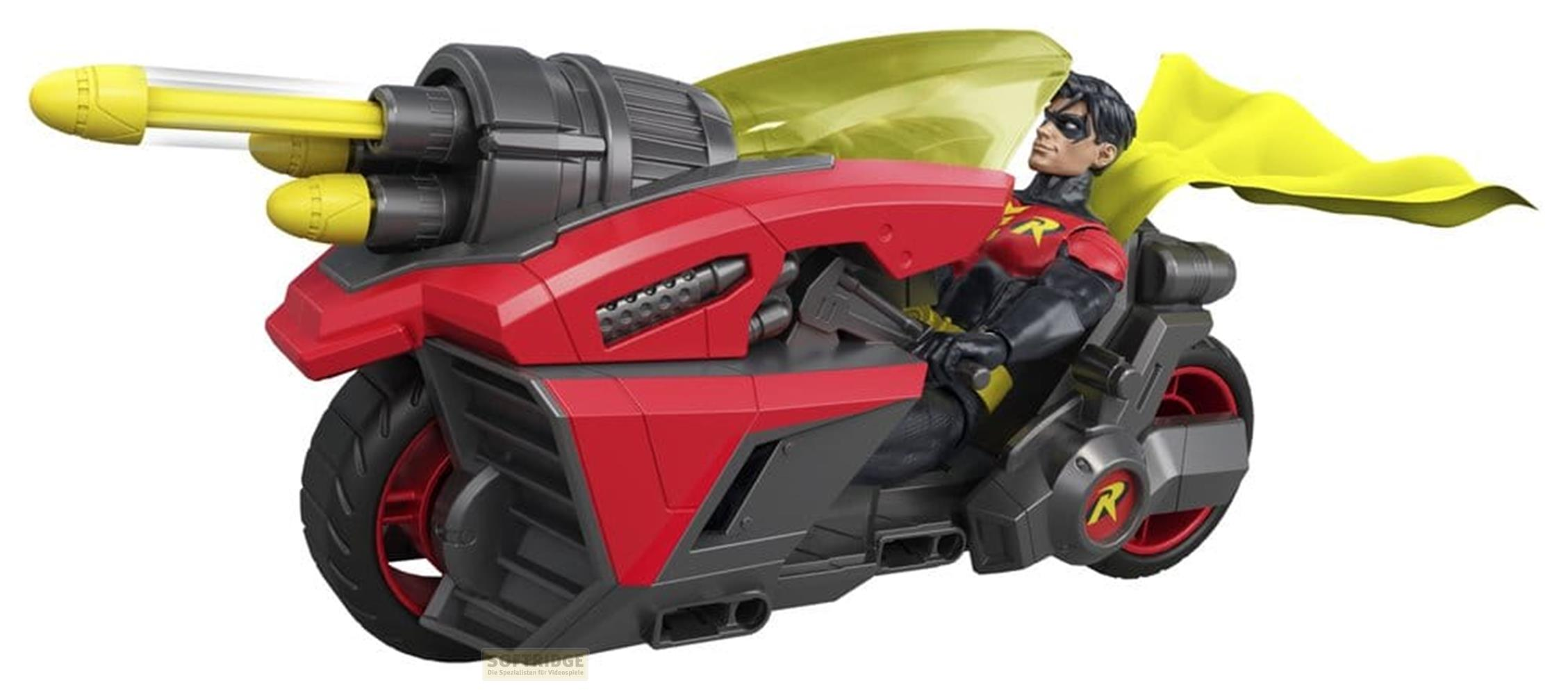 Eine Robin-Actionfigur fährt ein rot-schwarzes Spielzeugmotorrad mit einem großen gelben Raketenwerfer vorne.