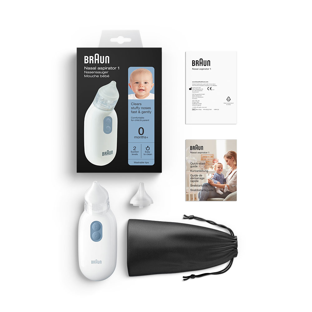 Aspiratore nasale Braun con scatola, punta di ricambio, manuali e custodia su sfondo bianco.