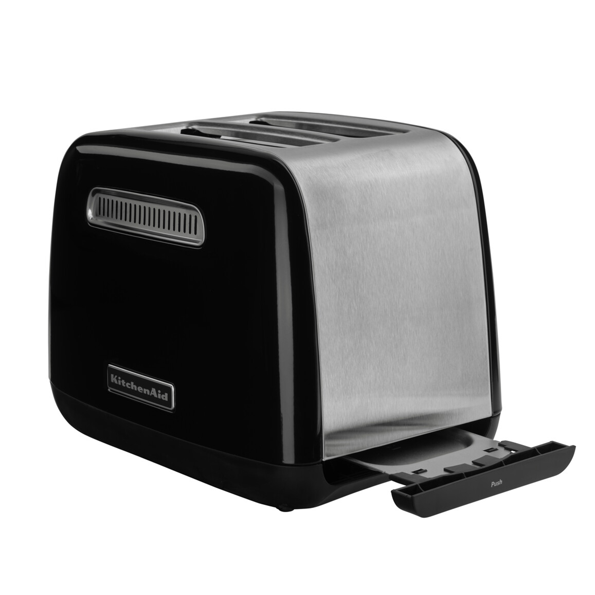 Czarno-srebrny toster KitchenAid z wysuniętą tacką na okruchy, widoczny z boku na białym tle.