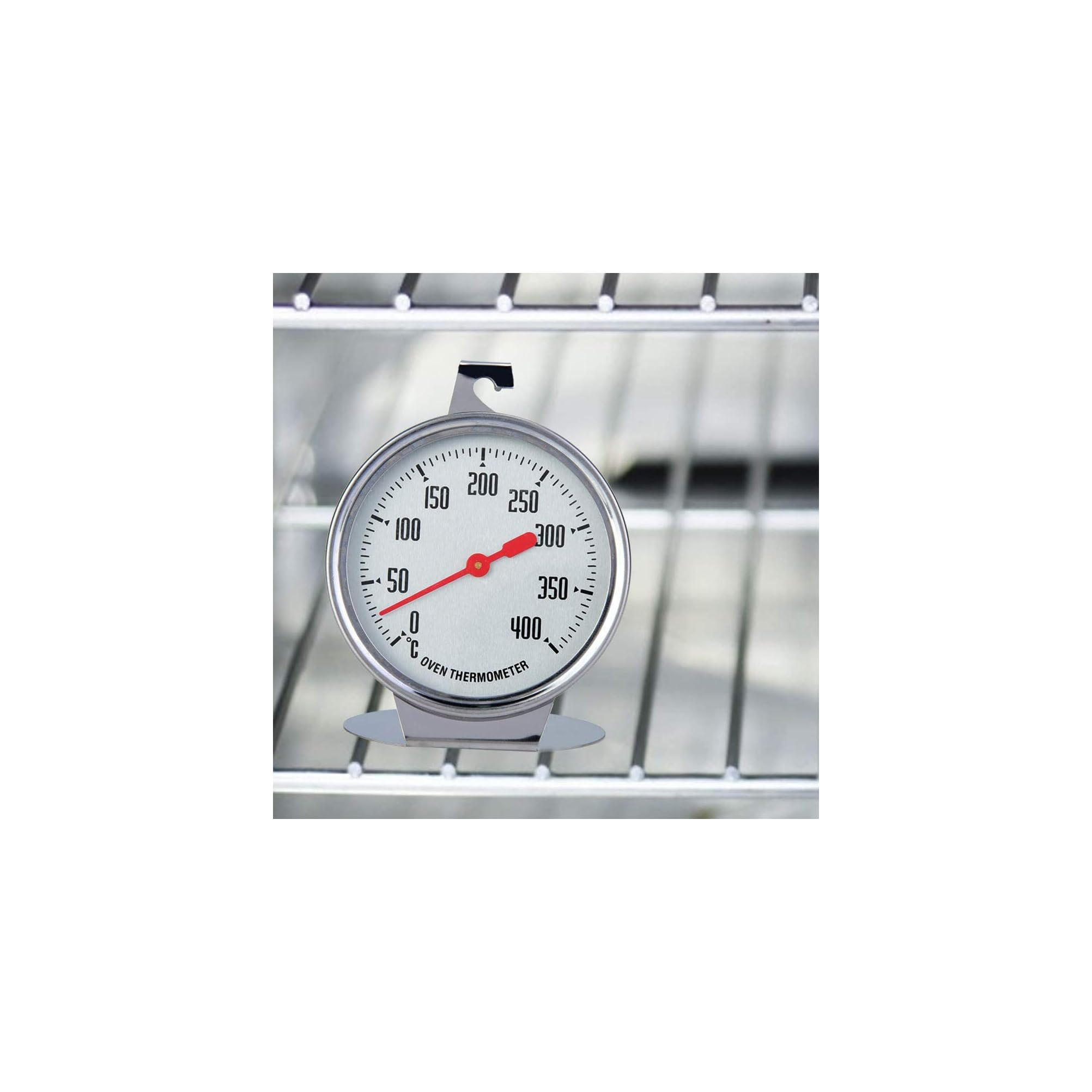 Ein Ofenthermometer aus Edelstahl mit einer Skala von 0 bis 400 °C, das auf einem Ofengitter steht.