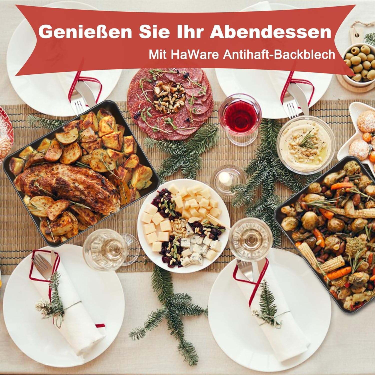 Festlicher Tisch mit Braten, Gemüse, Wurst, Käse, Wein und Tannenzweigen.
