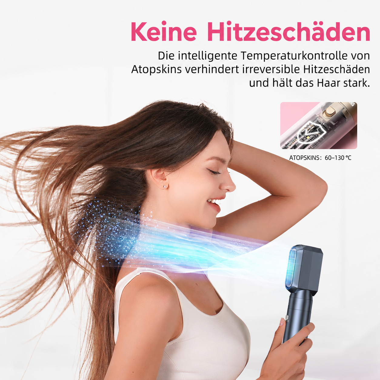 Eine Frau hält einen grauen Haartrockner, während ihr langes braunes Haar im Luftstrom weht. Text oben.