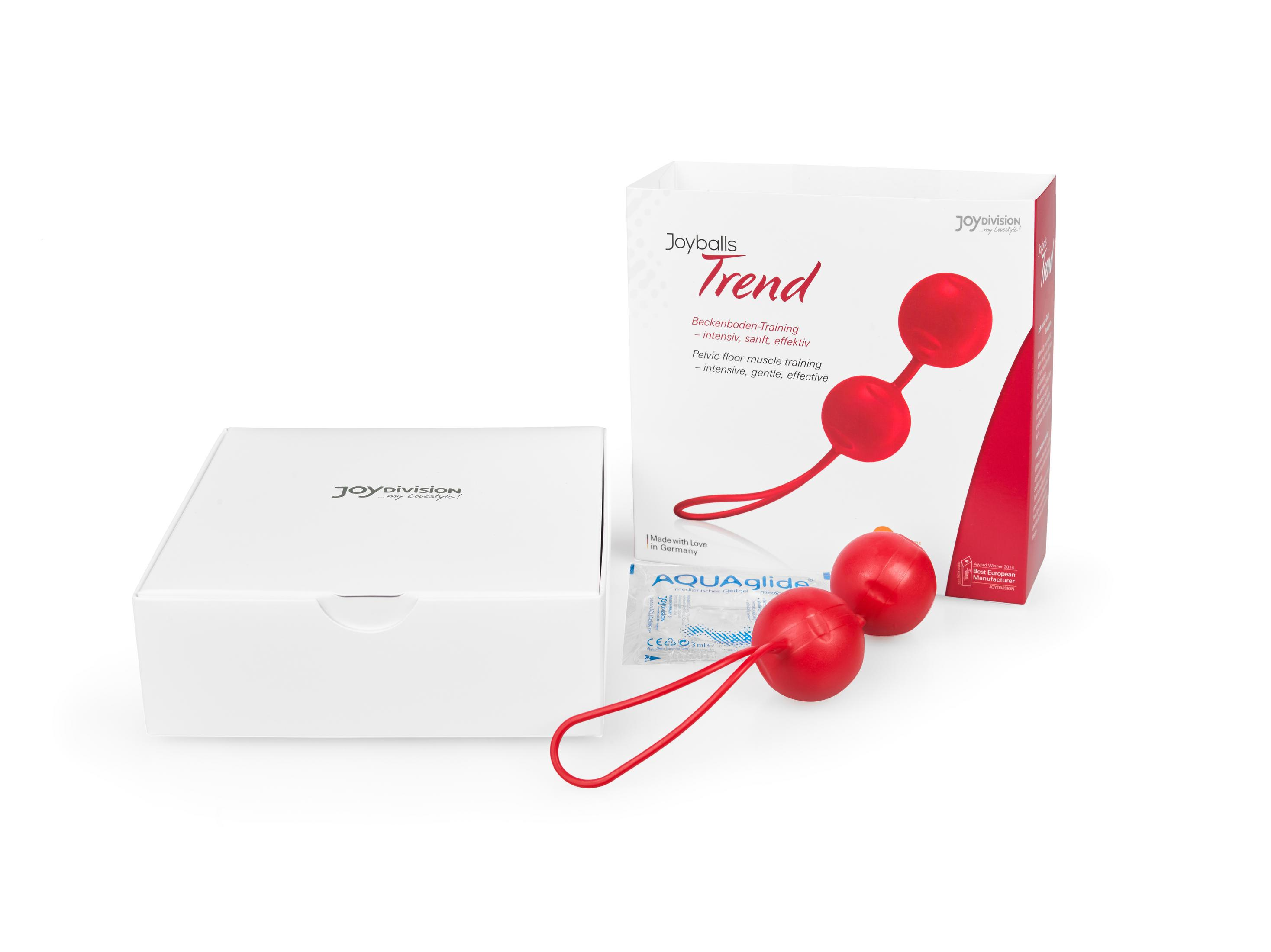 Rote Joyballs Trend Liebeskugeln mit Verpackung, Gleitmittel und weißer Schachtel.