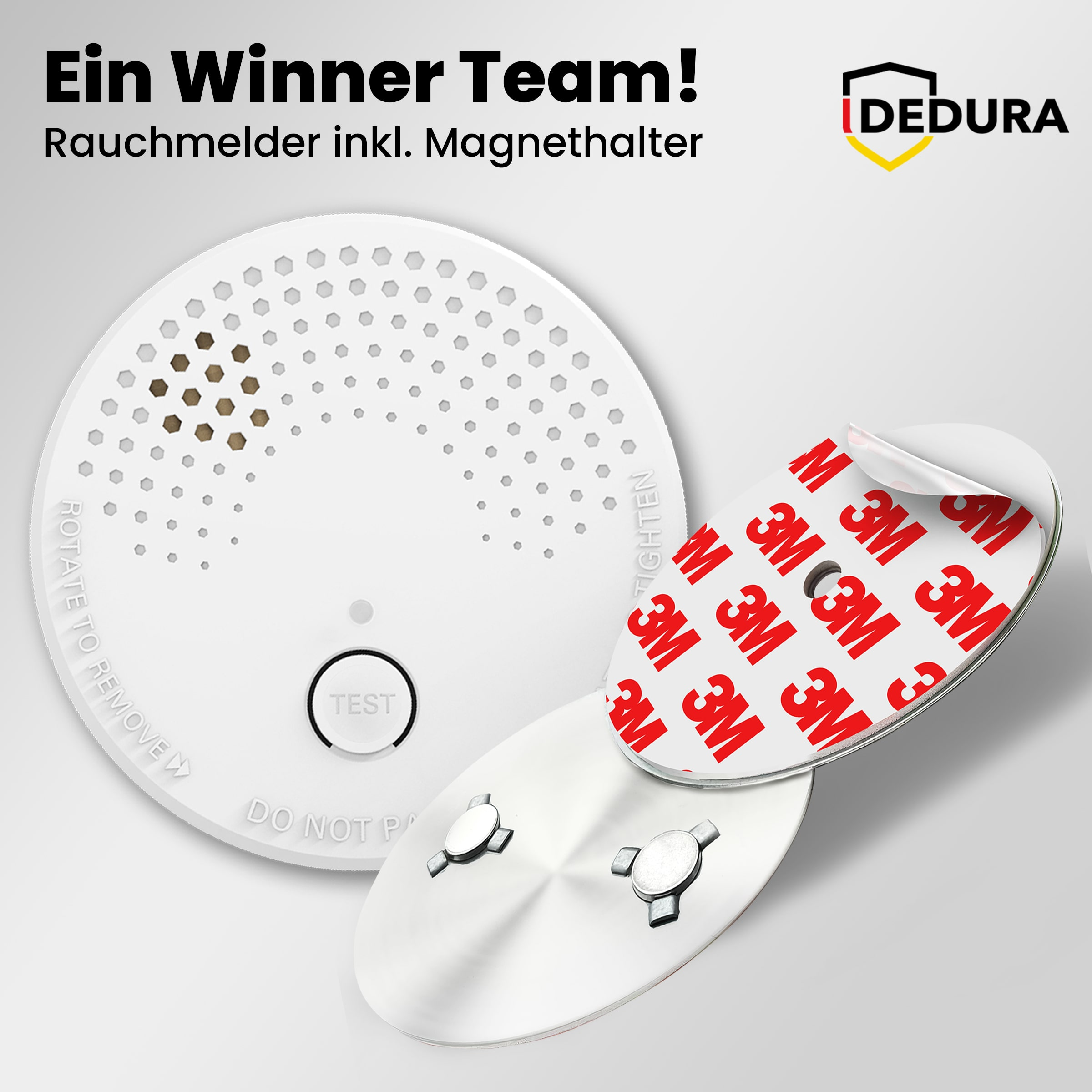 Weißer Rauchmelder mit Magnet-Halterung und 3M-Klebeband auf grauem Hintergrund.