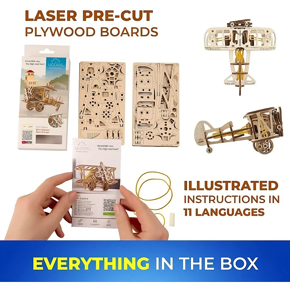 Modèle d'avion en bois avec planches découpées au laser, instructions et élastiques dans l'emballage.