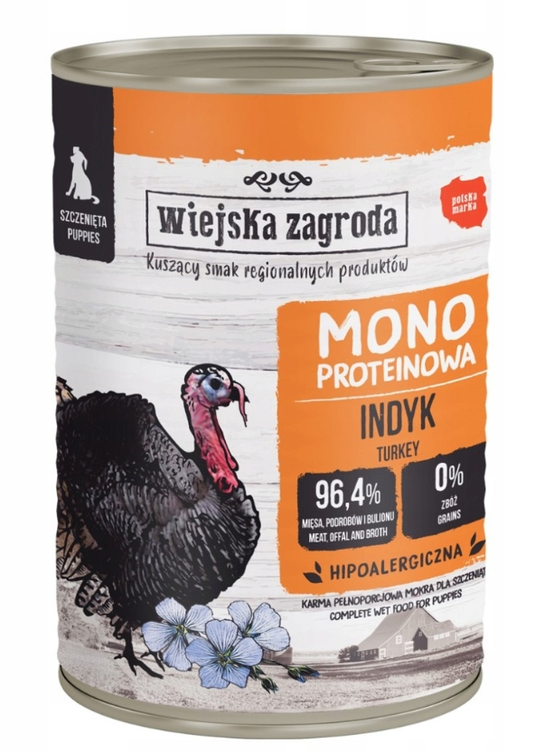 Una lata de comida húmeda para cachorros de pavo Wiejska Zagroda con flores de lino.