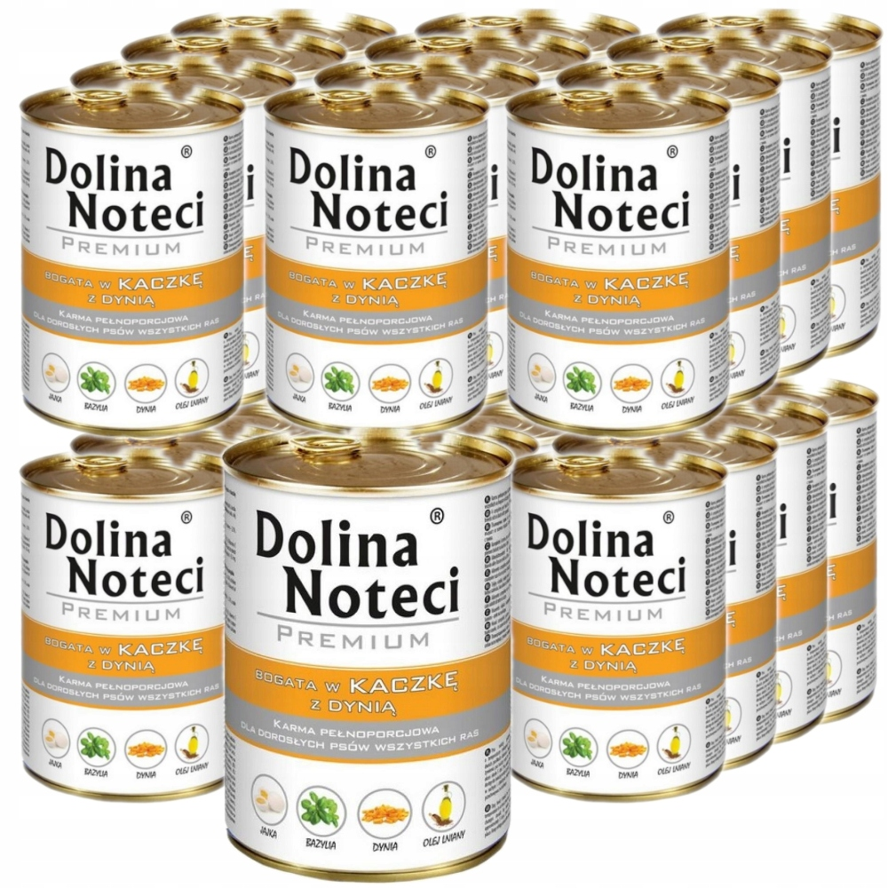 Pila de latas de comida para perros de color claro con etiquetas negras y naranjas.