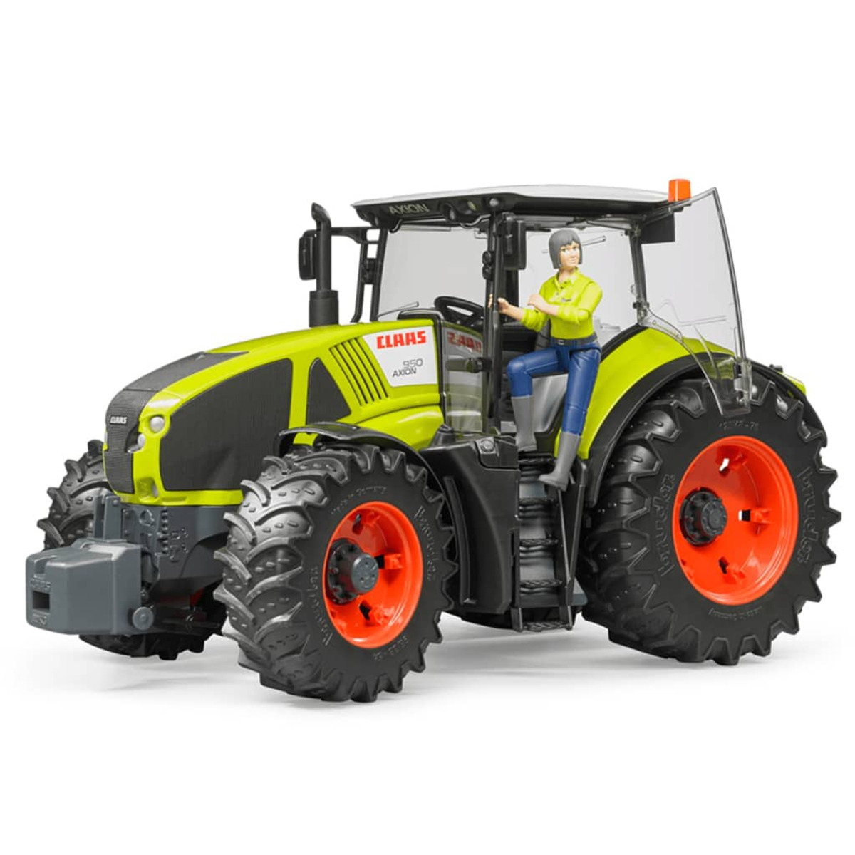 Ein gelber Claas-Spielzeugtraktor mit einer kleinen Figur auf den Stufen.