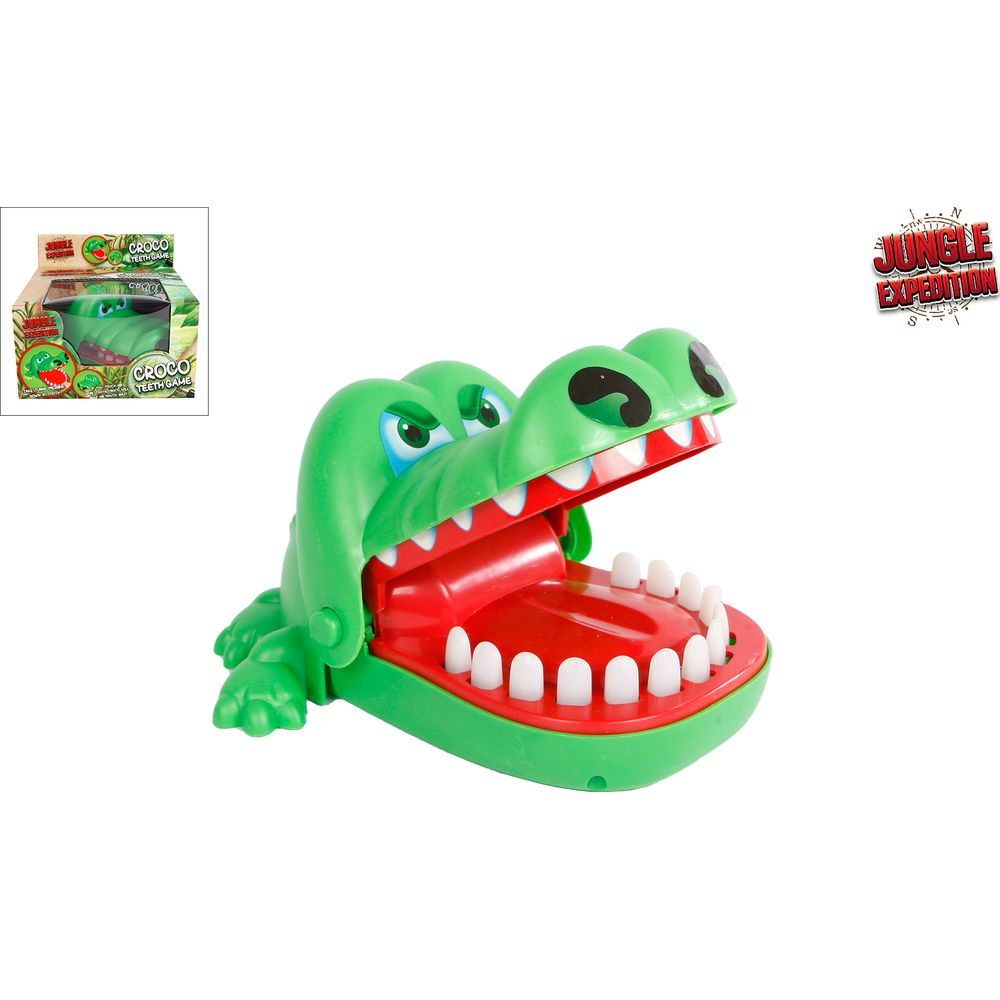 Jouet de dents de crocodile vert avec bouche ouverte, dents blanches et langue rouge, avec emballage.