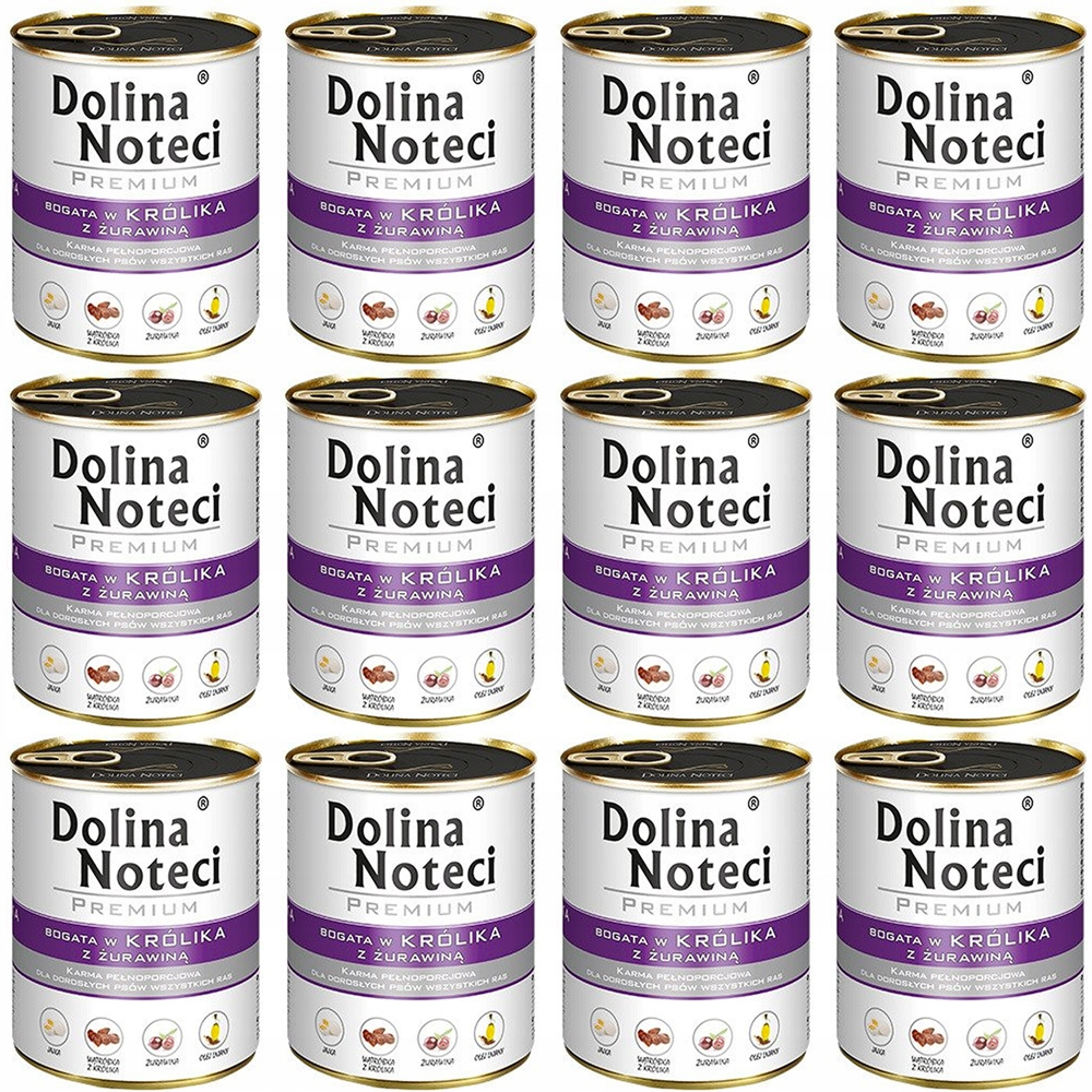 Doce latas blancas de comida para perros Dolina Noteci con etiquetas moradas dispuestas en una cuadrícula.