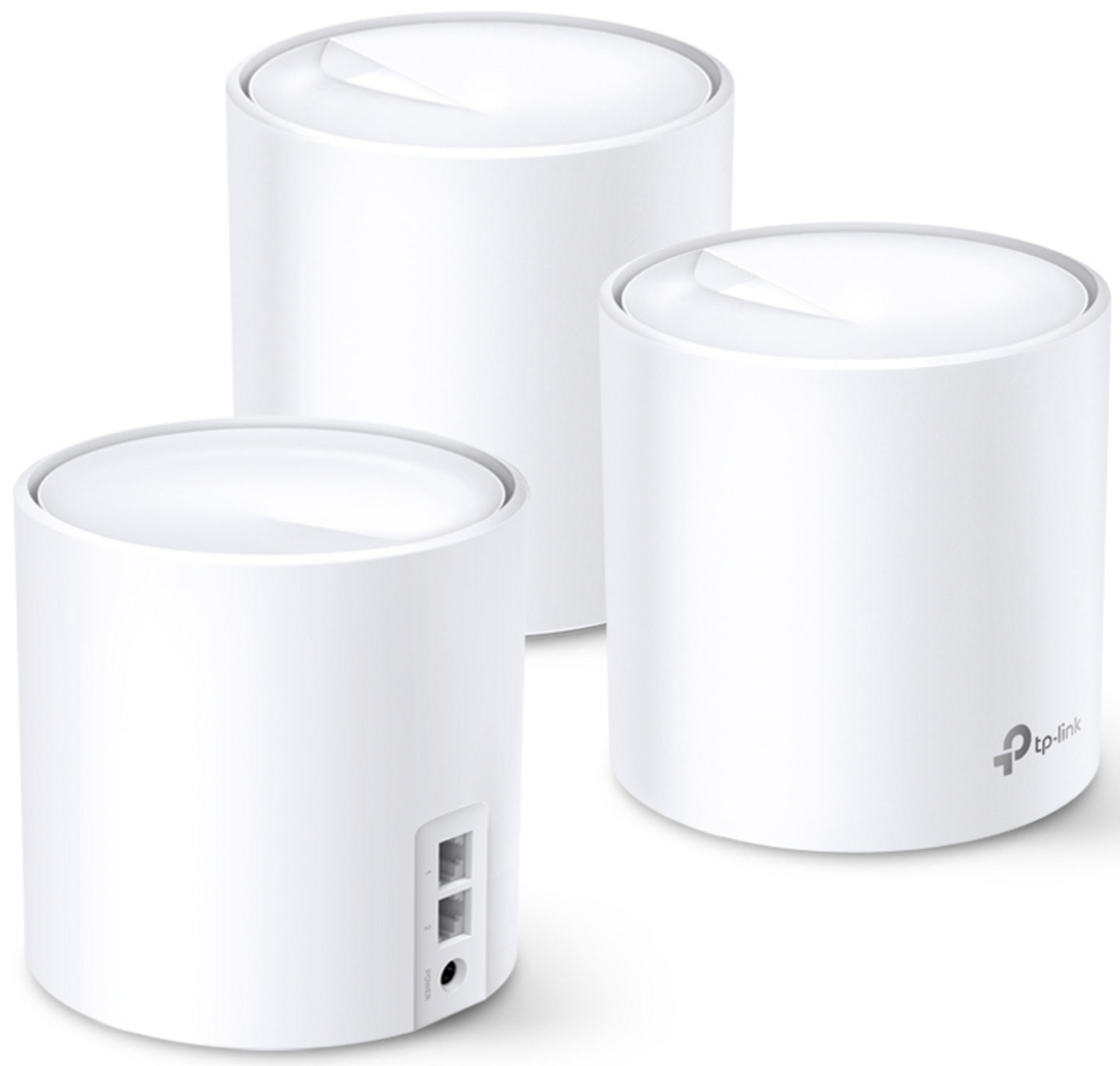 Tres routers Wi-Fi de malla TP-Link cilíndricos blancos sobre fondo blanco, con puertos visibles.