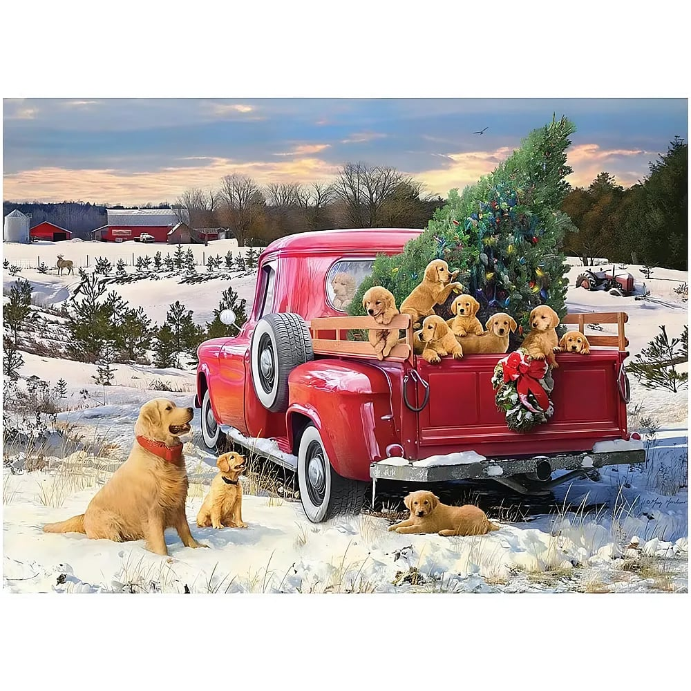 Golden Retriever Welpen im und am roten Lastwagen im verschneiten Feld.