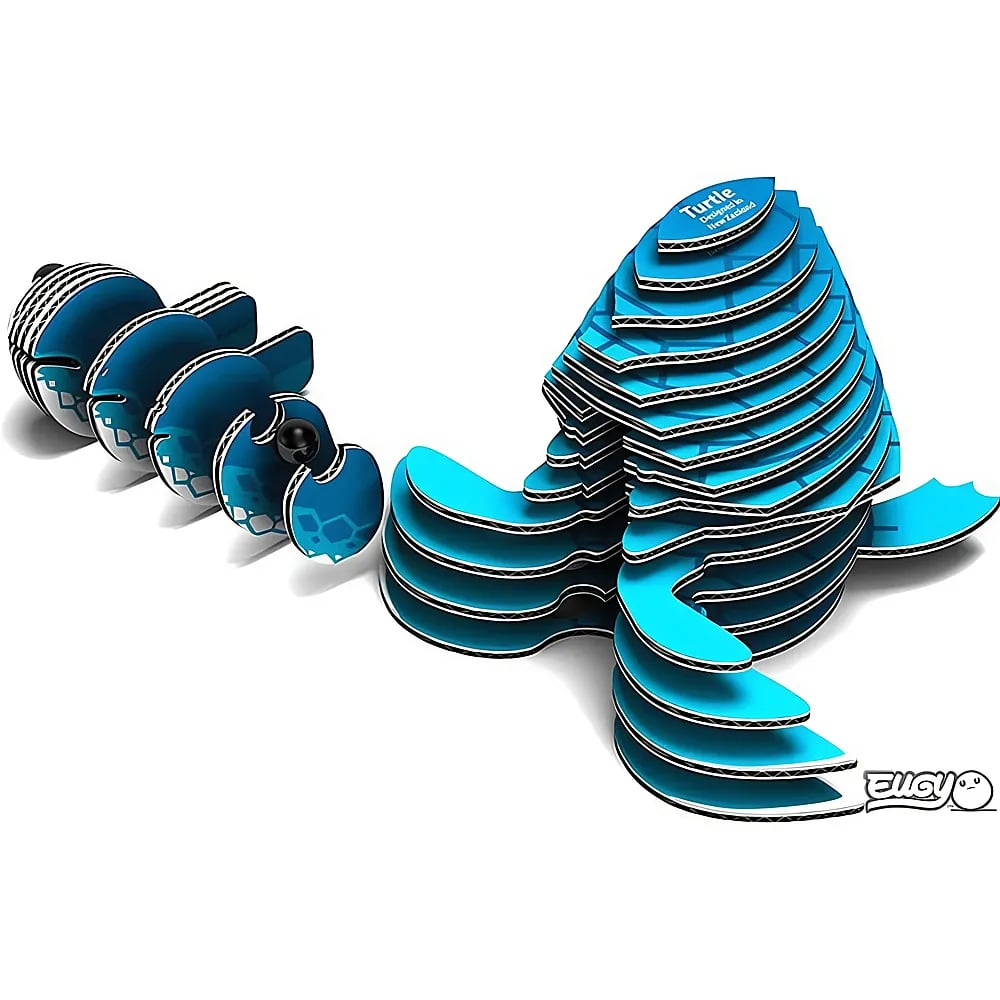 Un puzzle 3D en carton d'une tortue bleue sur fond blanc montre ses pièces superposées.