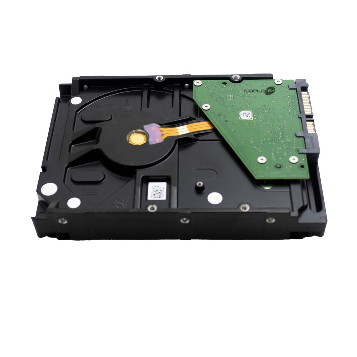 Un disco rigido per computer nero con circuito stampato verde visibile e pin connettore dorati su sfondo bianco.