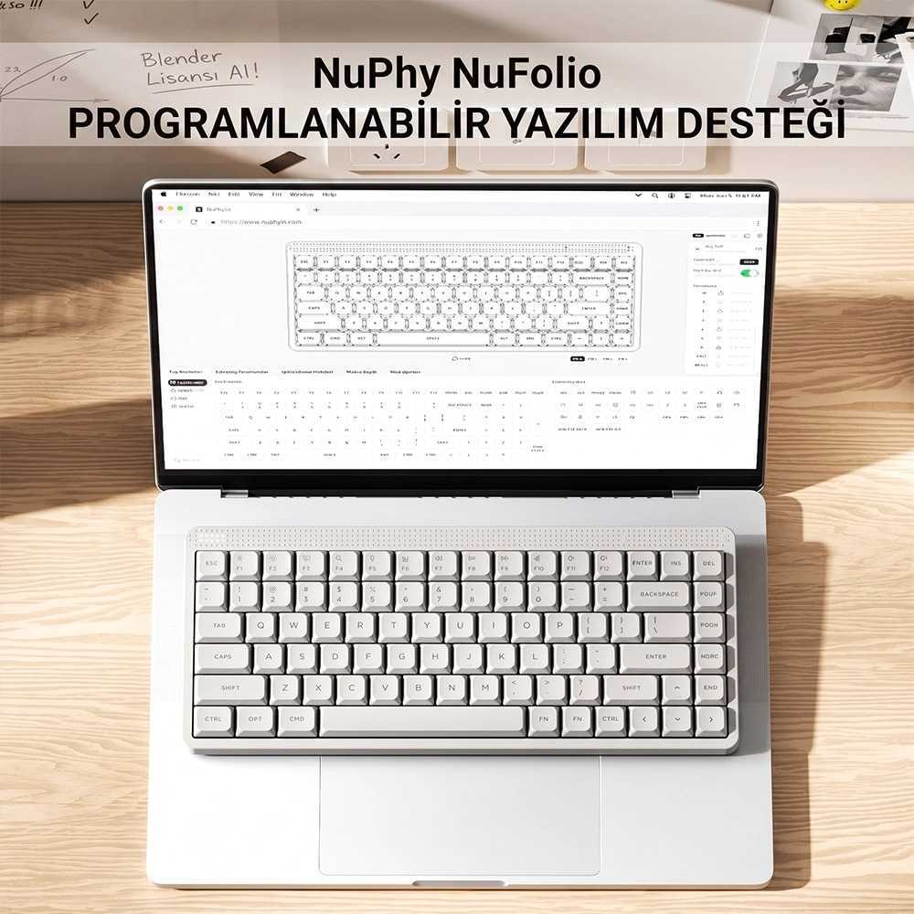 Biała klawiatura NuPhy NuFolio leży na laptopie przed ekranem z oprogramowaniem.