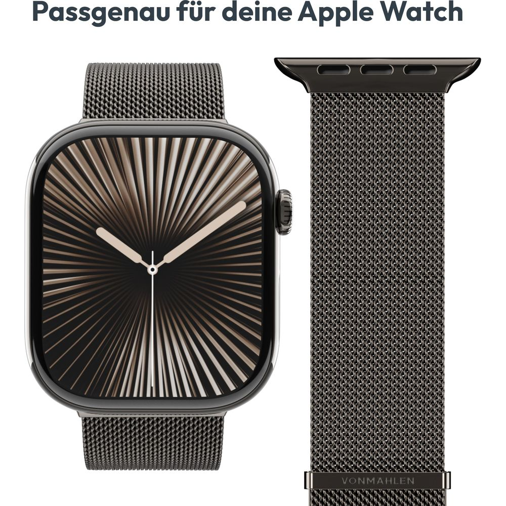 Un Apple Watch con cinturino in maglia di metallo scuro e quadrante geometrico, accompagnato da un cinturino.