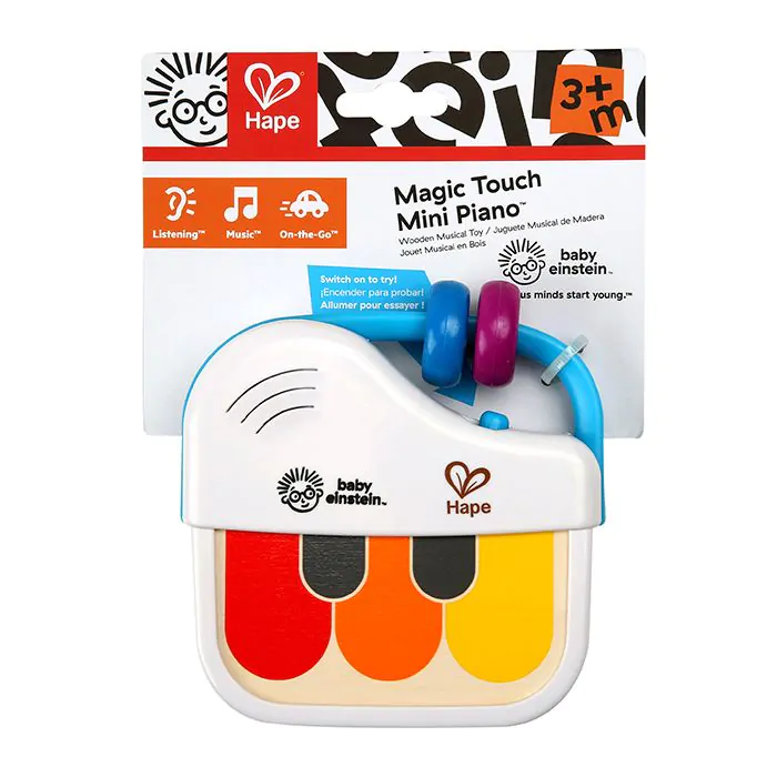 Un colorido juguete Baby Einstein Magic Touch Mini Piano en su empaque sobre un fondo blanco.