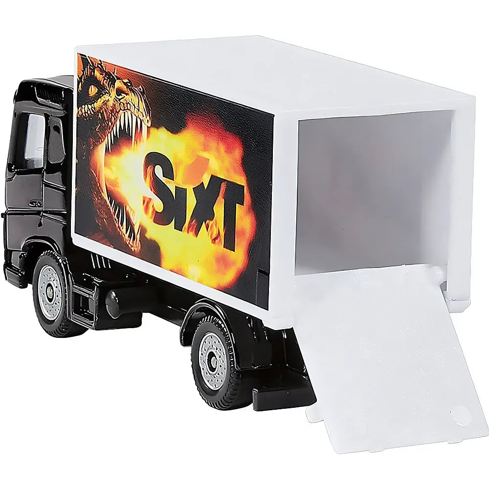 Un camion jouet noir avec caisse blanche, graphique de dinosaure et hayon ouvert sur fond blanc.