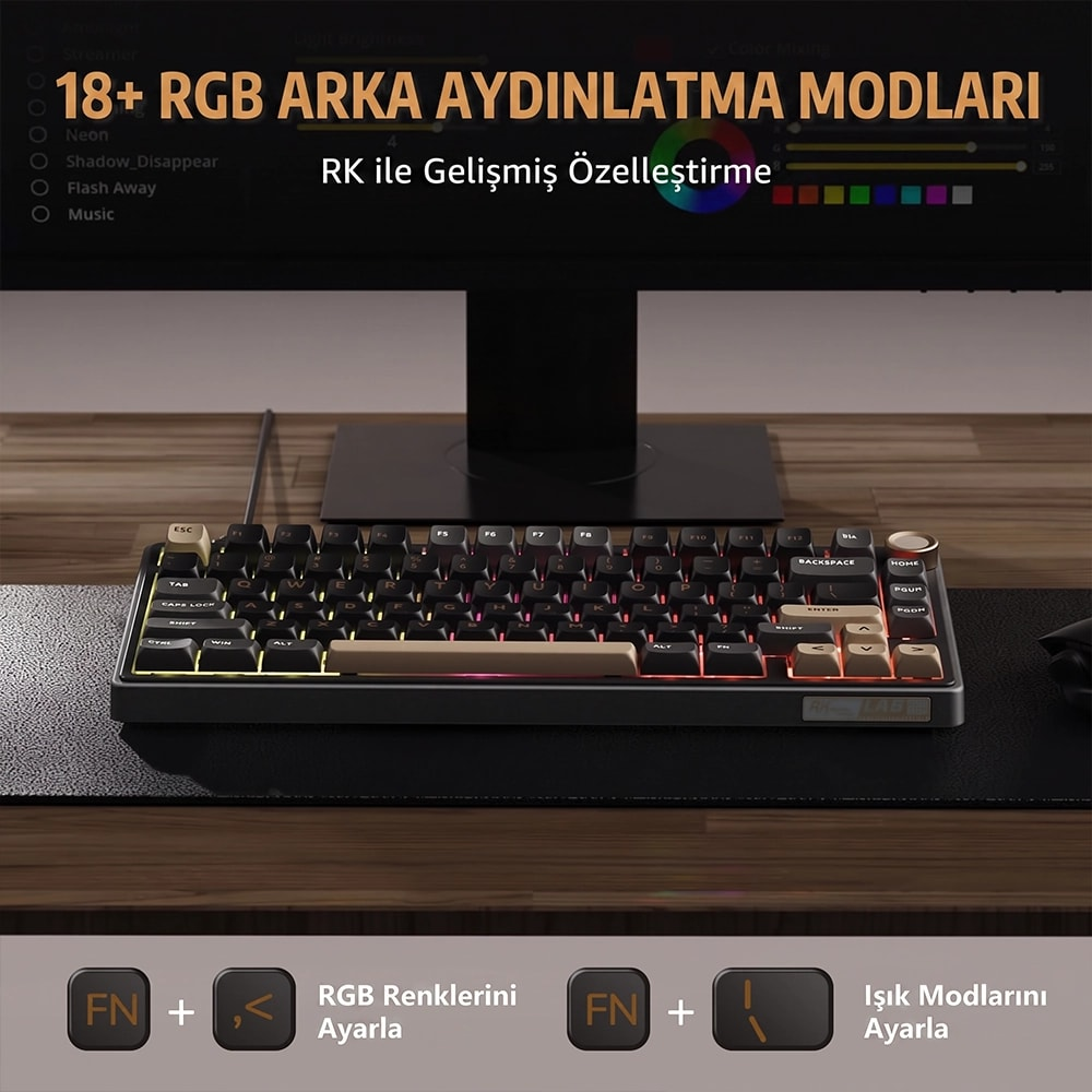 Mechaniczna klawiatura z podświetleniem RGB na drewnianym biurku przed monitorem z ustawieniami.