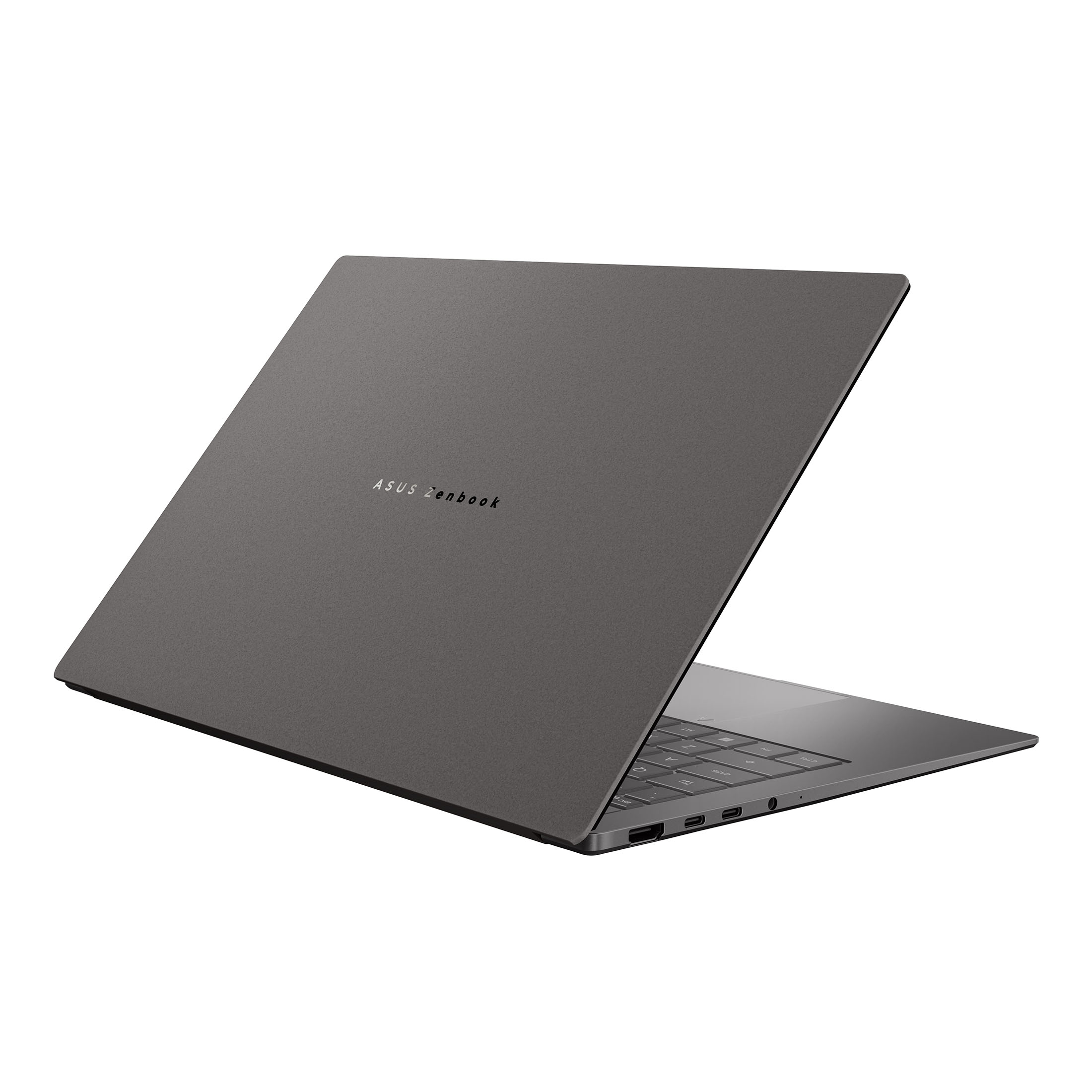 Ein geschlossener, grauer ASUS Zenbook Laptop auf weißem Hintergrund, mit sichtbaren Anschlüssen an der Seite.