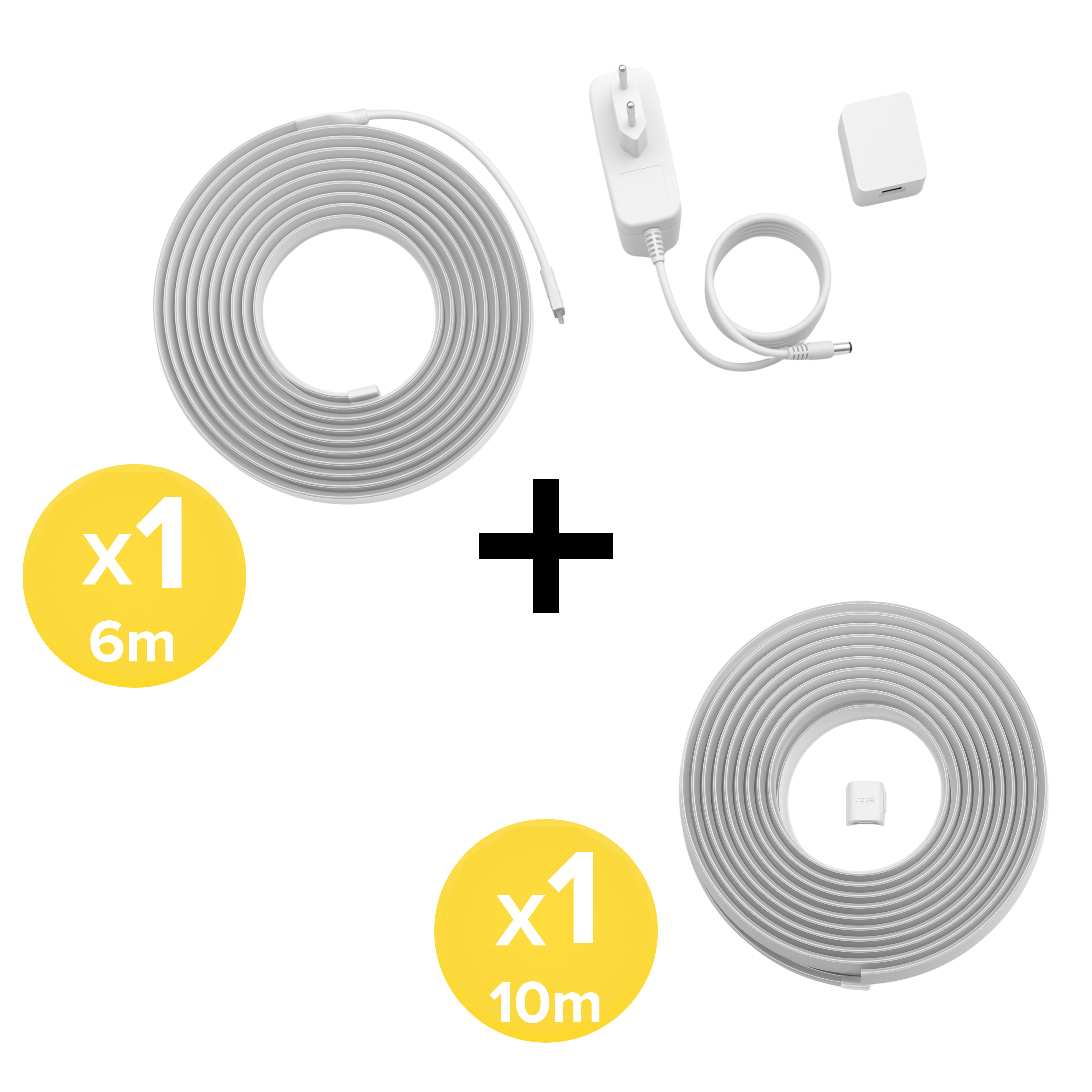 Una striscia LED da 6m, una da 10m e un alimentatore bianco con spina.